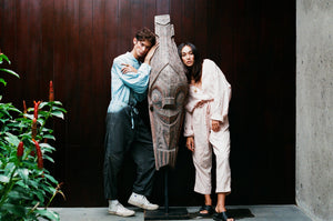 Look book photo Adventure Sail Jumpsuit in Two Tone Earth Meets Ocean and One Tone Coconut Pink featuring models Johnny and Amira.  